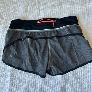 Lululemon Gray and Black shorts with Pink Accents
